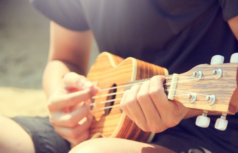 playing the ukulele